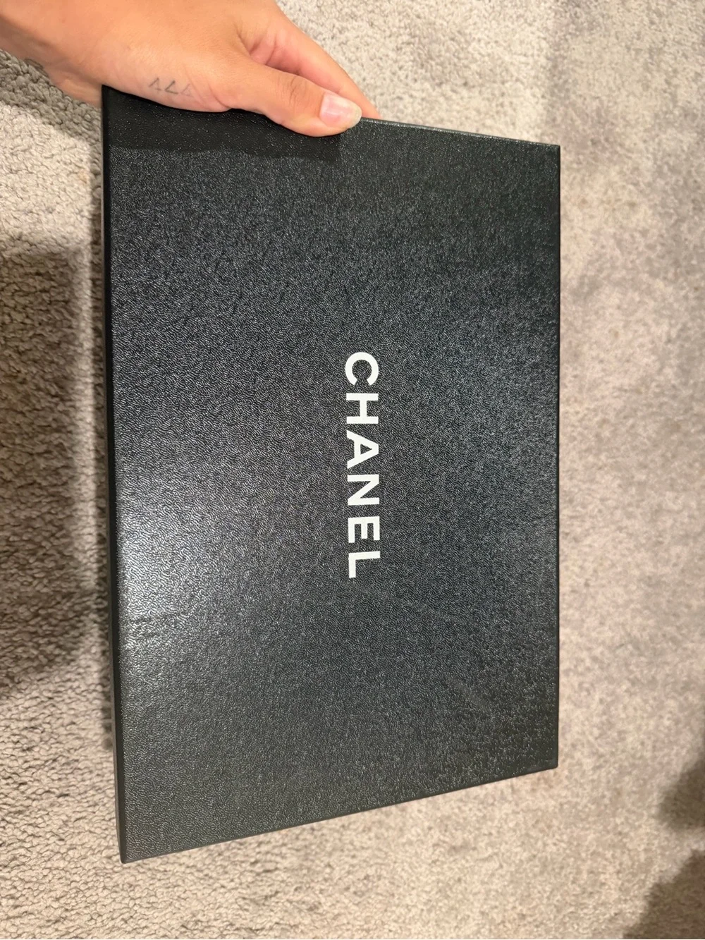 CHANEL Black Leather Loafers with Gold Heart Accent
